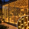 Novogodišnje LED lampice zavesa 3 x 3 m, 300 LED dioda, toplo bele ( KLK2665 )