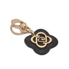 Obesek Liu Jo Flower Key Ring AF5221 E0538 Rjava
