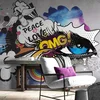 Samolepilna tapeta grafitno oko na sivem ozadju - 441x297