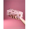 Sinsay - Kozmetička torbica sa printom jazavčara - pastelno roze