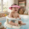 Set za kupanje bebe – Dolu sedište bež + Canpol štitnik roze