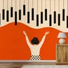 Samolepilna fototapeta črne klavirske tipke na oranžni - 343x231