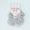 Be Cute Gumica za kosu, siva