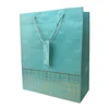 Ukrasne kese srednje 26X32X10 tirkizna