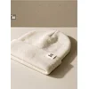 Sinsay - Kapa beanie sa zakrpom - krem