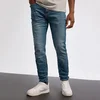Slim fit farmerke sa efektom izbledelosti