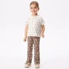 Reserved - Flare pantalone s dezenom