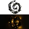 Božićna girlanda s LED svjetlima crna 2,7 m PVC
