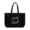 Karl Lagerfeld Nakupovalna torba Ikon Choupette črna / transparentna / bela