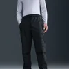 Nike M NK DF TCH WVN OH PANT, muške hlače, siva HM8241