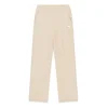Guess Spodnji del trenirke J6YB20 K5194 Bež Regular Fit