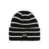 Cropp - Kapa beanie s potiskom - črna