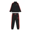 UNDER ARMOUR Športna trenirka Rival rdeča/črna
