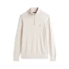 TOMMY HILFIGER Pulover ESSENTIAL pastelno rumena