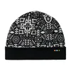Smartwool Thermal Merino dvostranska kapa z manšeto, črna, cvetlična ()