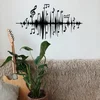 Wallity Metalna zidna dekoracija sa dezenom muzike 69x37 cm crna
