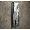 WallXpert slika na platnu PC080, ulica starog grada sa kulom i ženom pod žutim kišobranom, 30 x 80 cm