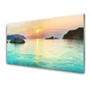 tulup.si Slika na akrilnem steklu Sun rocks sea landscape 140x70 cm 4 obešalnika