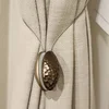 Magnet za zavesu ŠIŠARKA ELIPSA - Bronze