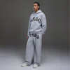 Cropp - Hlače za dojenčke s potiskom - light grey