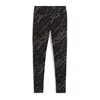 PUMA HELANKE PUMA ESS+ ANIMAL AOP LEGGINGS ŽENE