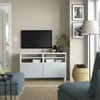 BESTA TV stalaža s vratima, bela/Selsviken/Stubbarp svetlosiva-plava, 120x42x74 cm