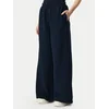 Tommy Jeans Spodnji del trenirke Script DW0DW23398 Mornarsko modra Wide Leg