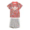 adidas Komplet majica in kratke hlače Liberty London JY3016 Rdeča Regular Fit