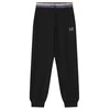 EA7 Emporio Armani Spodnji del trenirke 7G000266 AF12501 UC001 Črna Regular Fit