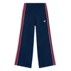 adidas Spodnji del trenirke Firebird Double Knit KD7825 Mornarsko modra Loose Fit