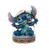 Enesco DISNEY STITCH FIGURICA Z BOŽIČNIMI LUČKAMI ZBIRKA TRADICIJE, (20838788)