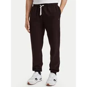 Tommy Hilfiger Spodnji del trenirke Essential MW0MW37231 Temno rjava Relaxed Fit