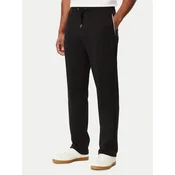 Tommy Hilfiger Spodnji del trenirke MW0MW44991 Črna Regular Fit