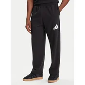 adidas Spodnji del trenirke Essentials JF3567 Črna Loose Fit