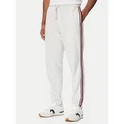 Tommy Hilfiger Spodnji del trenirke UM0UM03944 Svetlo siva Regular Fit