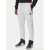 adidas Spodnji del trenirke Essentials Feelcozy Fleece JE3819 Svetlo siva Regular Fit