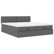 Vidaxl Otomanski posteljni okvir z vzmetnicami siv 180x200 cm blago