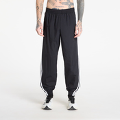 adidas Spodnji del trenirke Firebird Woven KE1371 Črna Regular Fit