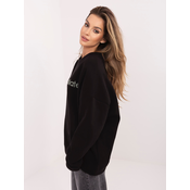 Črno-zelen oversized pulover z vezenjem