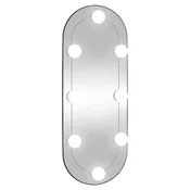 Vidaxl Stensko ogledalo z LED lučkami 20x50 cm stekleno ovalno