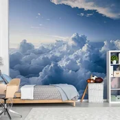 Foto tapeta - Aerial Landscapes: Rays Lighting Up Fluffy Cloud Formations 500x350
