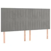 Vidaxl Vzglavje za postelje svetlo sivo 200x5x118/128 cm žamet