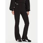 Puma Spodnji del trenirke PUMA X ROSÉ 635156 01 Črna Slim Fit