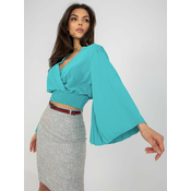 Blue formal blouse with clutch neckline