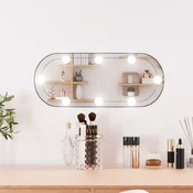 vidaXL Stensko ogledalo z LED lučkami 20x50 cm stekleno ovalno