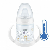 Otroška učna steklenička NUK z nadzorom temperature 150 ml bela