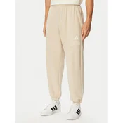 adidas Donji dio trenerke Seasonal Essentials Collegiate French Terry Cuffed KF4265 Bež Regular Fit