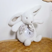 Plišasti zajček Musical Night Light Star Projector White Doudou et Compagnie z lučko glasbo in belim šumom 19 cm od 0 mes