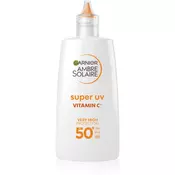 Garnier Zaščitni fluid proti temnim madežem z vitaminom C SPF 50+ Ambre Solaire (Super UV Fluid) 40 ml