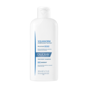 Ducray Squanorm šampon protiv suhe peruti (Anti-Dandruff Treatment Shampoo - Dry Dandruff) 200 ml